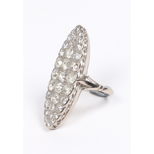 19 - AN 18 CARAT WHITE GOLD AND DIAMOND RING. the navette form head set with an arrangement of 33 diamond... 