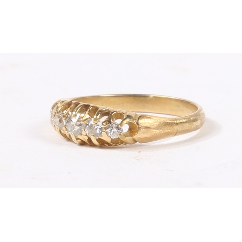 2 - AN 18 CARAT GOLD AND DIAMOND RING. the head set with five graduated round cut diamonds, ring size N,... 