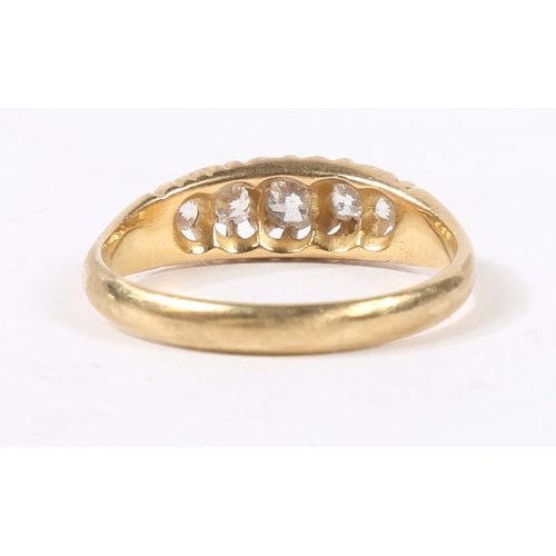 2 - AN 18 CARAT GOLD AND DIAMOND RING. the head set with five graduated round cut diamonds, ring size N,... 