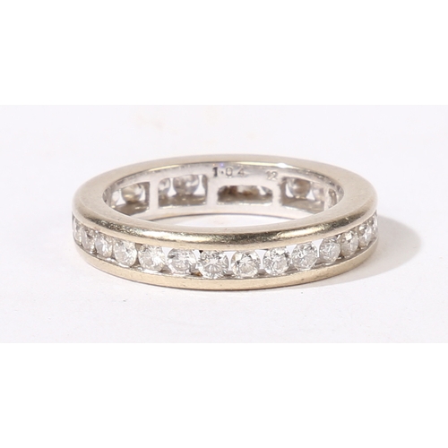 22 - AN 18 CARAT WHITE GOLD AND DIAMOND FULL ETERNITY RING. channel set with 30 round cut diamonds, ring ... 