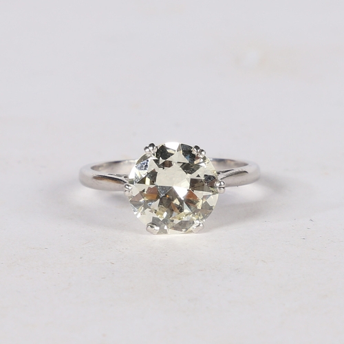 24 - AN IMPRESSIVE DIAMOND AND PLATINUM SOLITAIRE RING. the circular brilliant cut diamond weighing 3.60c... 