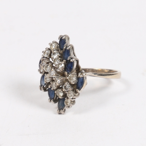 28 - AN 28 CARAT WHITE GOLD, SAPPHIRE AND DIAMOND CLUSTER RING. set with seventeen round cur diamonds fla... 