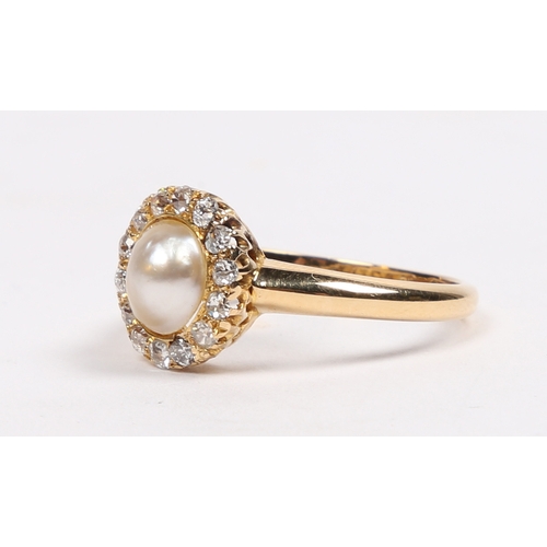 47 - A VICTORIAN 18 CARAT GOLD, PEARL AND DIAMOND RING. the central pearl surrounded by a band of fourtee... 