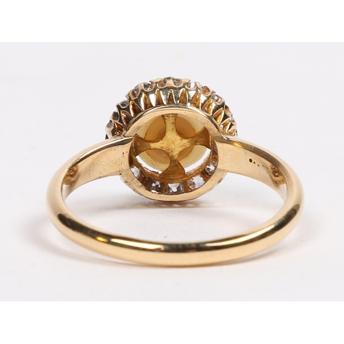 47 - A VICTORIAN 18 CARAT GOLD, PEARL AND DIAMOND RING. the central pearl surrounded by a band of fourtee... 