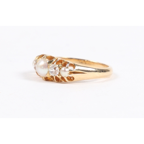 48 - A YELLOW METAL, PEARL AND DIAMOND RING. the pierced shoulders set with a central round pearl flanked... 