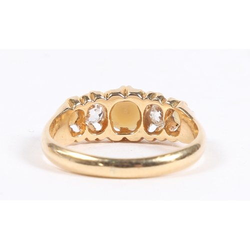 48 - A YELLOW METAL, PEARL AND DIAMOND RING. the pierced shoulders set with a central round pearl flanked... 