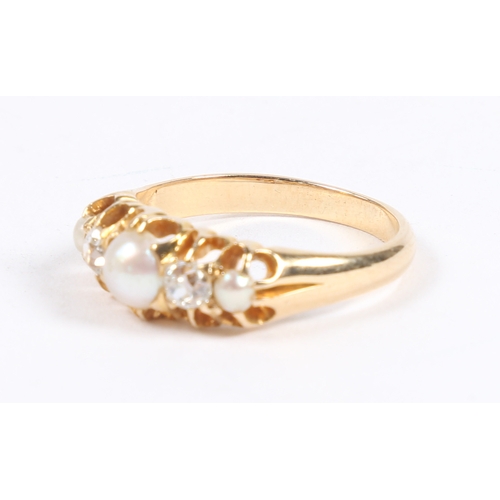 48 - A YELLOW METAL, PEARL AND DIAMOND RING. the pierced shoulders set with a central round pearl flanked... 