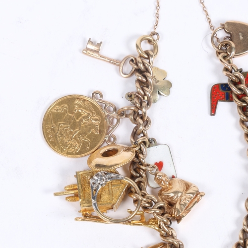 64 - A 9 CARAT GOLD CHARM BRACELET. set with 22 charms including a George V half sovereign 1907, cuckoo c... 