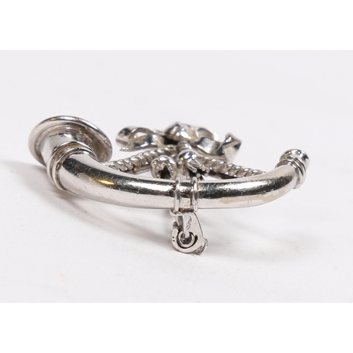 65 - AN 18 CARAT WHITE GOLD SWEETHEART BROOCH. modelled as a cap badge of the 52nd (Oxfordshire ) Regimen... 