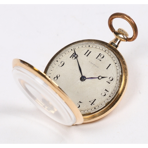 75 - A CARTIER 18 CARAT GOLD LADIES OPEN FACE POCKET WATCH. the signed silver dial with engine turned eff... 