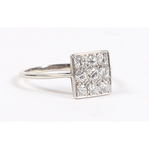 8 - A PLATINUM AND DIAMOND RING. the square head set with nine round cut diamonds, the interior of the b... 