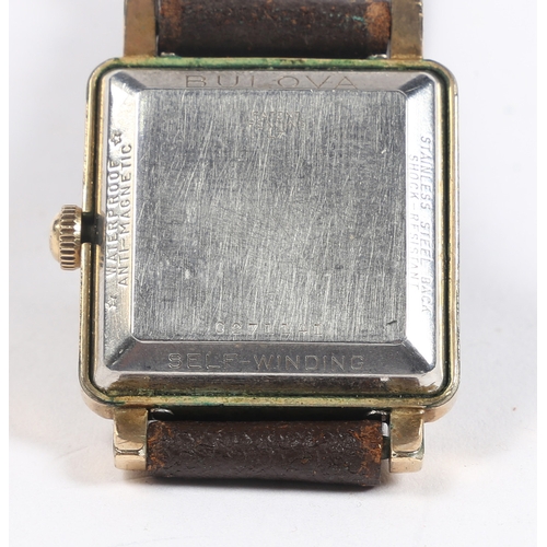 86 - A BULOVA GENTLEMAN'S ROLLED GOLD WRISTWATCH. the signed white dial with Arabic and baton markers, au... 