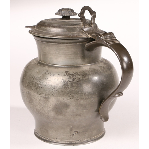 109 - A 19TH CENTURY LARGE PEWTER LIDDED ALE JUG, ENGLISH, CIRCA 1840. Having a bulbous body, a domed lid ... 