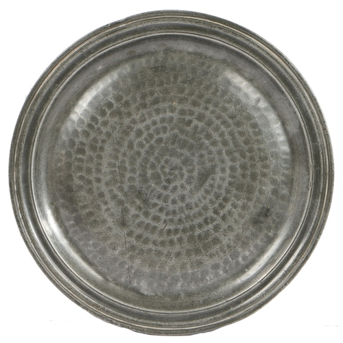 110 - A FINE PEWTER MULTI-REED NARROW RIM AND HAMMERED ALL-OVER PLATE, DEVONSHIRE, CIRCA 1690. The well wi... 