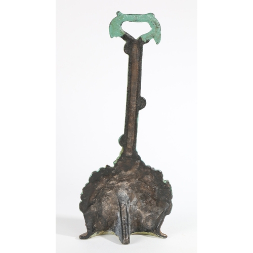 117 - A CAST IRON AND PAINTED DOOR PORTER. In the form of a fruit and floral filled basket, 35cm high.