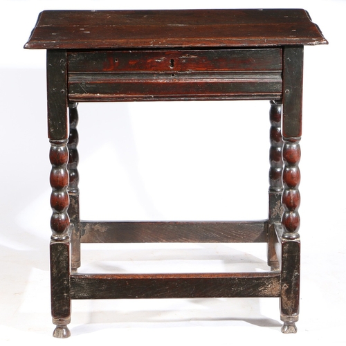 144 - A SMALL CHARLES II OAK SIDE TABLE, CIRCA 1680. Having a top of two boards with ovolo-moulded edge, a... 