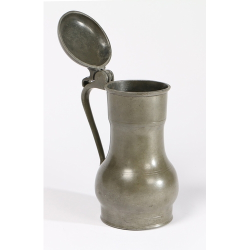 146 - A PEWTER 'REMBRANDT-TYPE' FLAGON, DUTCH, CIRCA 1700. Of typical shouldered bulbous form, maker's tou... 