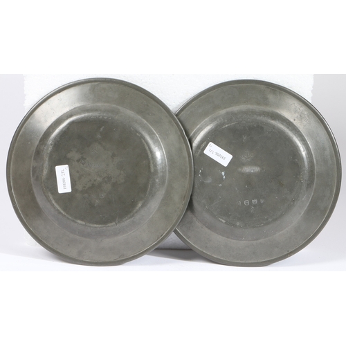 147 - A PAIR OF GEORGE II PEWTER PLAIN RIM PLATES, CIRCA 1730-50. Each with ownership medallion 'Borough o... 