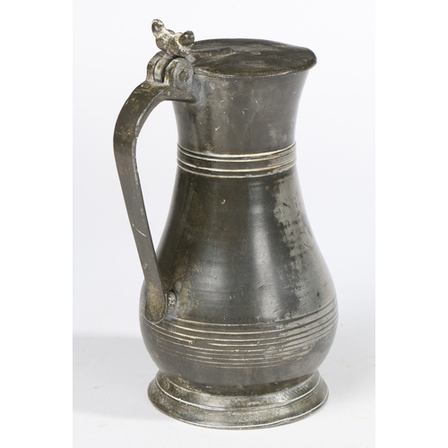 148 - A GEORGE III PEWTER PINT GUERNSEY MEASURE, SOUTHAMPTON, CIRCA 1760. With typical heart-shaped lid, t... 