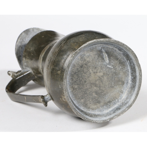 148 - A GEORGE III PEWTER PINT GUERNSEY MEASURE, SOUTHAMPTON, CIRCA 1760. With typical heart-shaped lid, t... 