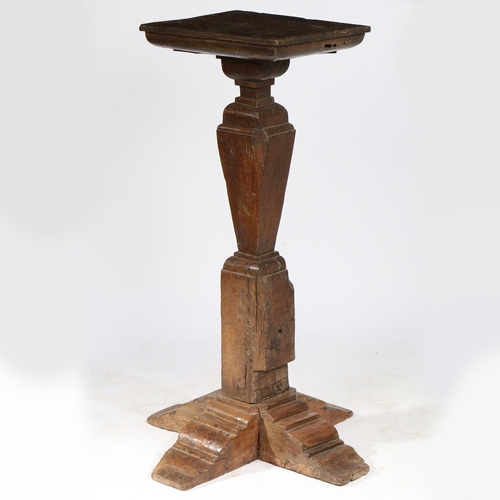 155 - AN OAK PEDESTAL/TORCHÃRE STAND, TIMBERS CIRCA 1500-50 AND LATER. The square top with stepped unders... 