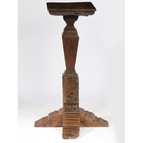 155 - AN OAK PEDESTAL/TORCHÃRE STAND, TIMBERS CIRCA 1500-50 AND LATER. The square top with stepped unders... 