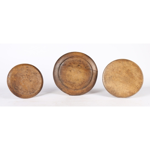 166 - THREE 18TH CENTURY SYCAMORE PLATES OR PLATTERS, ENGLISH. One with a narrow flat rim, sides and base,... 