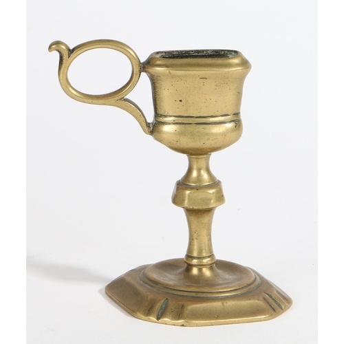 177 - AN EARLY 18TH CENTURY MANNER BRASS UPRIGHT CANDLE-SNUFFER STAND. The elongated oval cup fitted with ... 