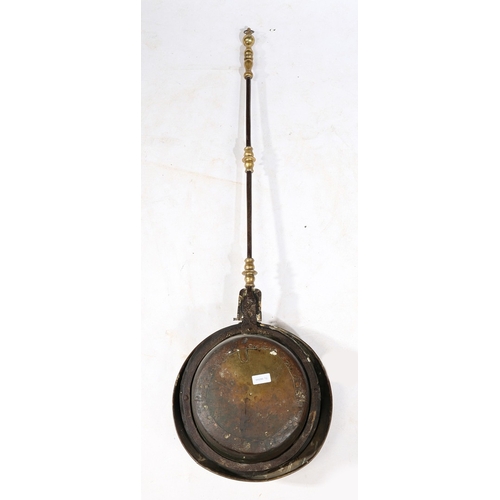 180 - A BRASS AND IRON WARMING PAN, DUTCH, CIRCA 1700. Having a domed, pierced and geometric punched -deco... 