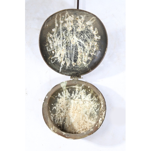 180 - A BRASS AND IRON WARMING PAN, DUTCH, CIRCA 1700. Having a domed, pierced and geometric punched -deco... 