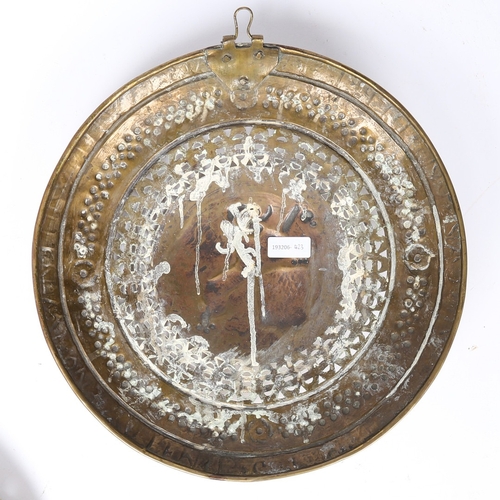 193 - A BRASS WARMING PAN LID, DUTCH, DATED 1614. The pierced and repousé decorated cover centred by a lio... 