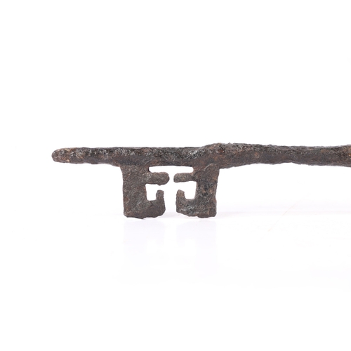 201 - A LARGE AND IMPRESSIVE 14TH CENTURY IRON KEY, ENGLISH, CIRCA 1300. Having a long pointed solid shank... 