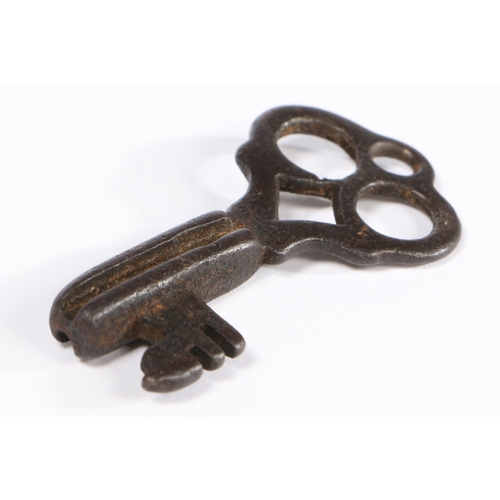 203 - A SMALL 14TH CENTURY BRONZE-ALLOY KEY, CIRCA 1300-1400. Having a channel-moulded solid shank, notche... 