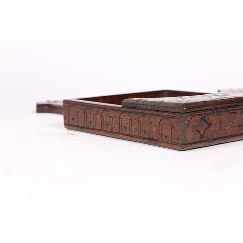 223 - A GEORGE I OAK HAND-HELD OFFERTORY BOX, WELSH, DATED '1726'. Of open galleried-tray form, the basebo... 