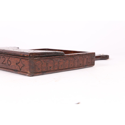 223 - A GEORGE I OAK HAND-HELD OFFERTORY BOX, WELSH, DATED '1726'. Of open galleried-tray form, the basebo... 