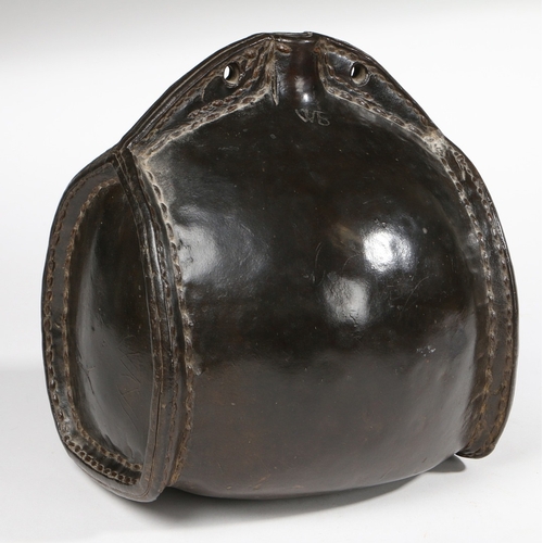 23 - A GOOD AND LARGE LEATHER COSTREL, ENGLISH, CIRCA 1700. Of barrel-form, with sloping shoulders pierce... 