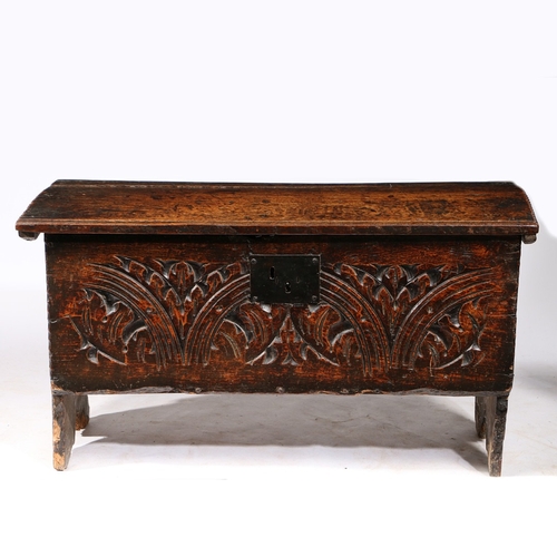 370 - A CHARLES I CARVED OAK AND ELM BOARDED CHEST, WEST COUNTRY, CIRCA 1630, WITH RARE CHARLES II PRINTED... 