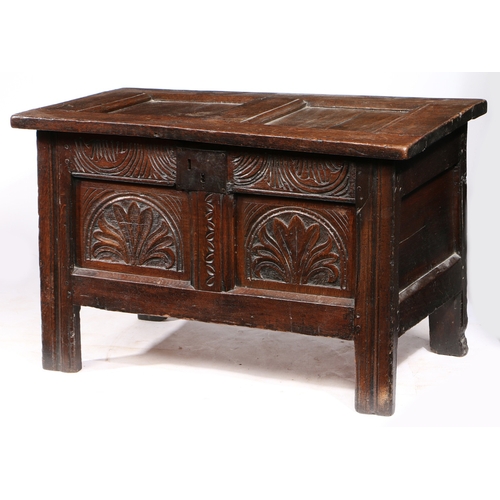 381 - A SMALL CHARLES I OAK COFFER, WEST COUNTRY, CIRCA 1630. Having a twin-panelled hinged lid, the front... 