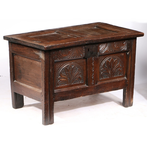 381 - A SMALL CHARLES I OAK COFFER, WEST COUNTRY, CIRCA 1630. Having a twin-panelled hinged lid, the front... 