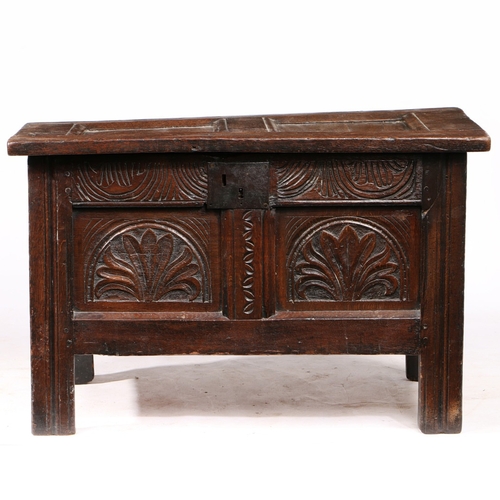 381 - A SMALL CHARLES I OAK COFFER, WEST COUNTRY, CIRCA 1630. Having a twin-panelled hinged lid, the front... 