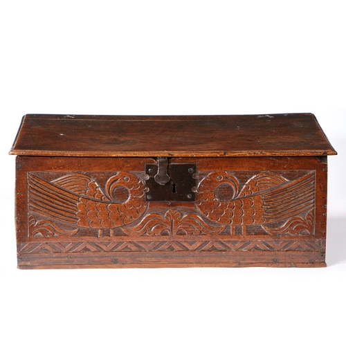 386 - A CHARLES II BOARDED OAK BOX, CIRCA 1670. The hinged lid principally of one board, with moulded edge... 