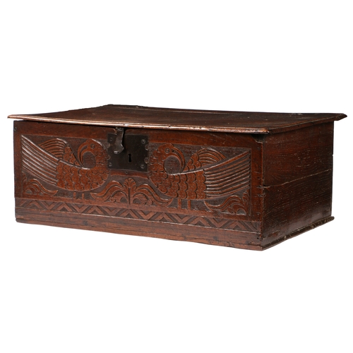 386 - A CHARLES II BOARDED OAK BOX, CIRCA 1670. The hinged lid principally of one board, with moulded edge... 