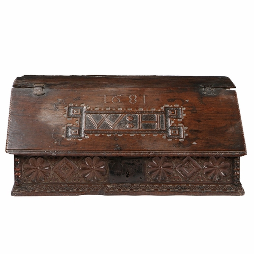 40 - A CHARLES II BOARDED OAK DESK BOX, NORTH COUNTRY, DATED 1681. With fixed top, the sloping fall carve... 