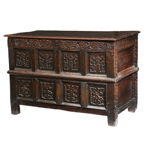 423 - A RARE CHARLES II CARVED OAK COFFER WITH DRAWER, CUMBRIA/LANCASHIRE, DATED 1671. Having a boarded hi... 