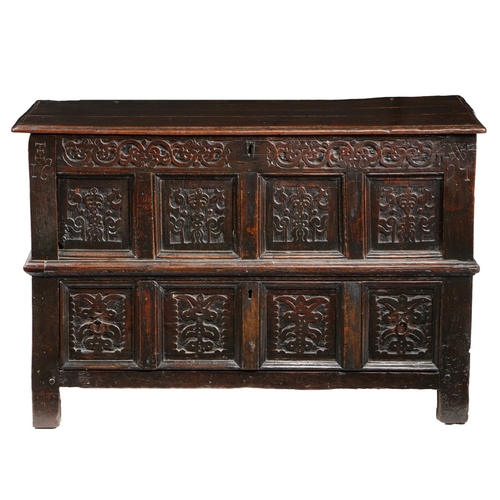 423 - A RARE CHARLES II CARVED OAK COFFER WITH DRAWER, CUMBRIA/LANCASHIRE, DATED 1671. Having a boarded hi... 