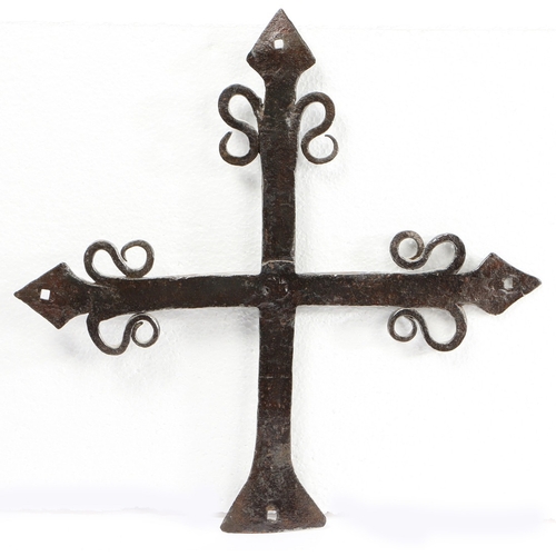 50 - AN IRON PROCESSIONAL CROSS, PROBABLY 17TH CENTURY. The upright post and cross bar all with scroll-wo... 