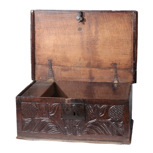 63 - A CHARLES II OAK BOARDED BOX, NORTH COUNTRY, CIRCA 1670. The lid principally of one wide board, the ... 