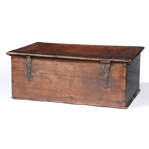 63 - A CHARLES II OAK BOARDED BOX, NORTH COUNTRY, CIRCA 1670. The lid principally of one wide board, the ... 