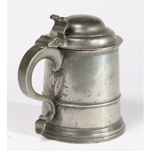 66 - A RARE AND GOOD PEWTER OEAS HALF-GALLON DOME-LIDDED TANKARD, LONDON, CIRCA 1720. Having a scroll thu... 