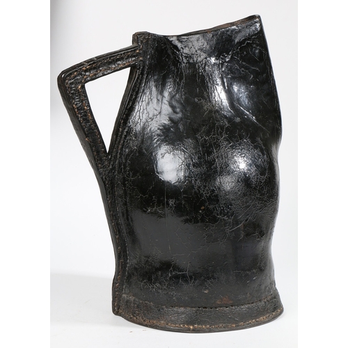 71 - A HIGHLY IMPRESSIVE AND RARE LEATHER BOMBARD, ENGLISH, CIRCA 1680-1700. In the form of a large jug, ... 